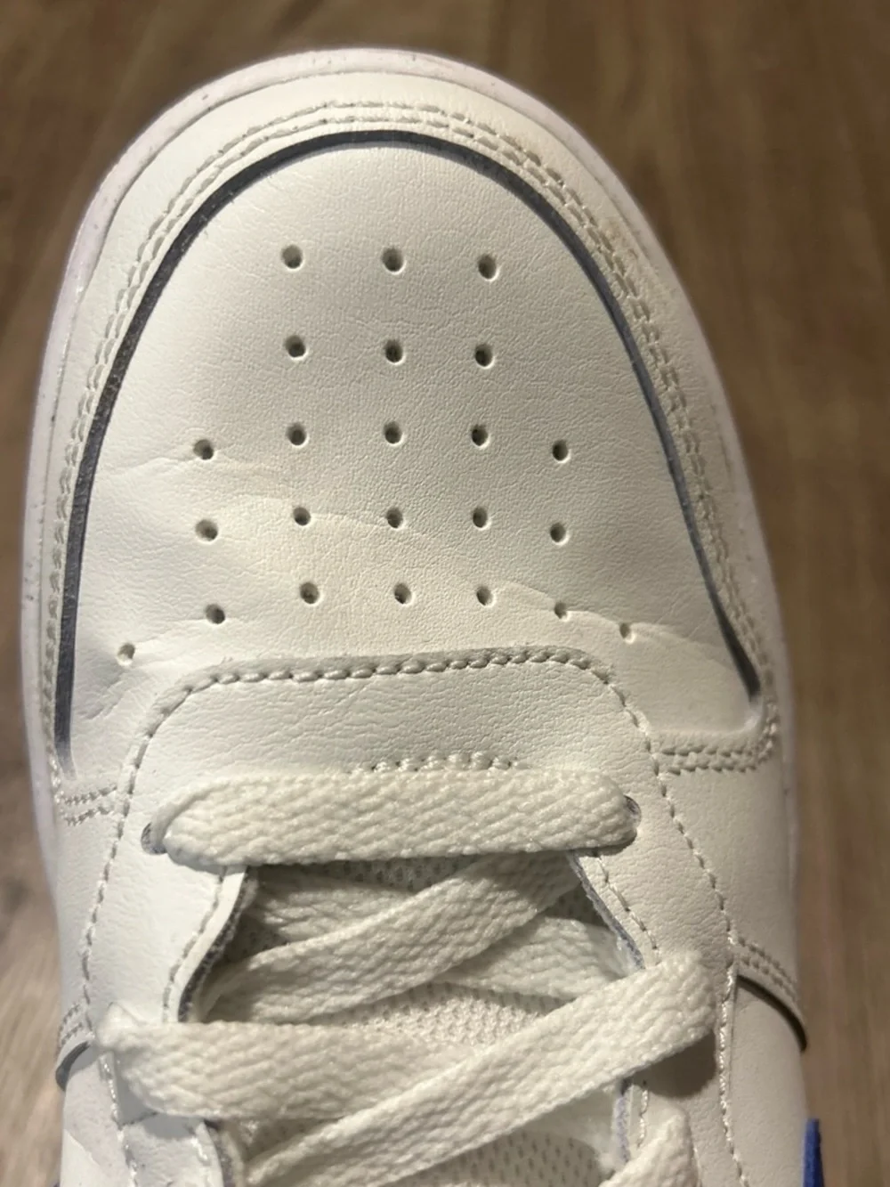 Nike White and Blue Mid-Top Sneakers